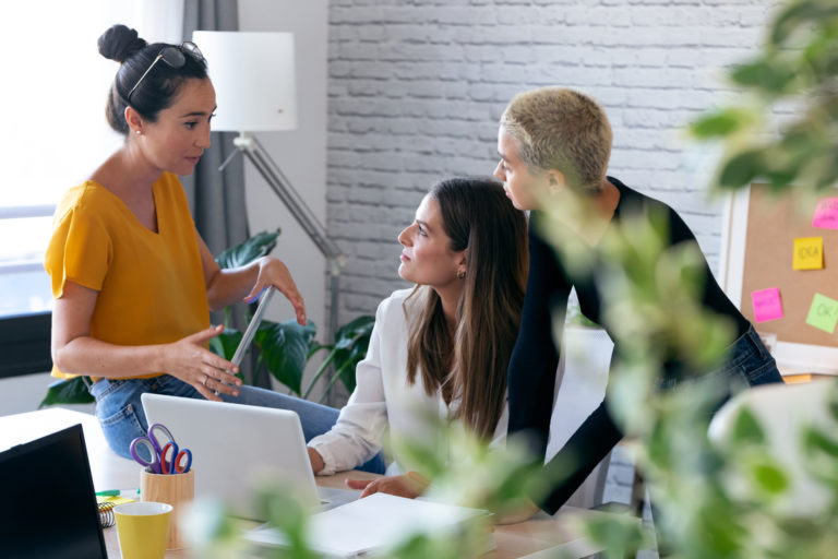 Shot of three modern female entrepreneurs who talk about new ideas for to next work in a joint workspace.